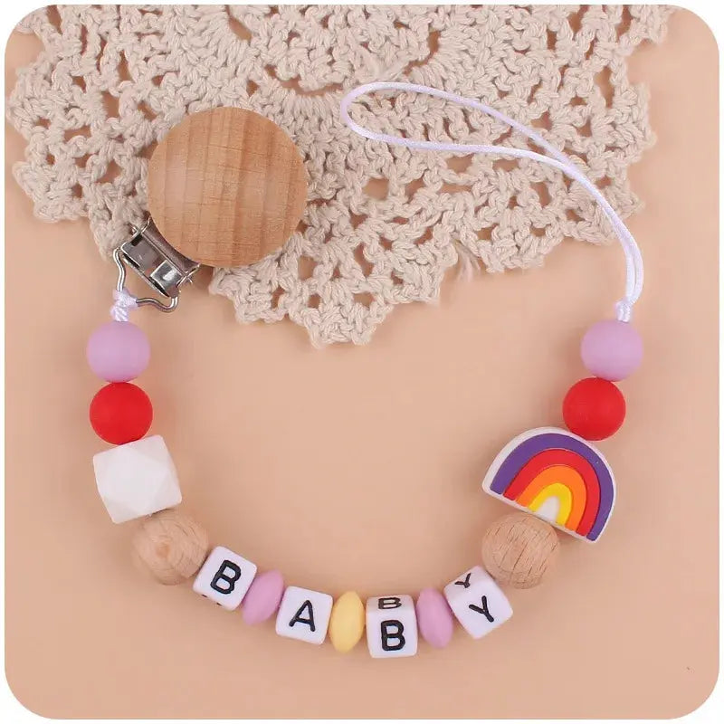 Attache tetine - Attache sucette - Arc en ciel Mon Shopping Bébé