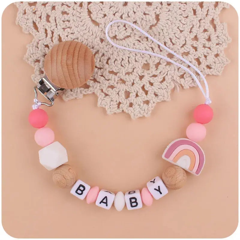 Attache tetine - Attache sucette - Arc en ciel Mon Shopping Bébé